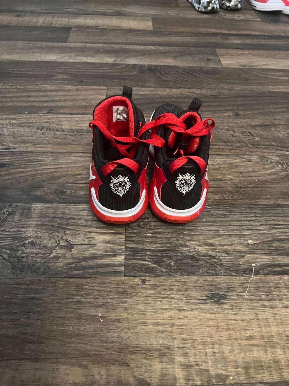 Youth Red and Black Athletic Sneakers with Lace Closure
